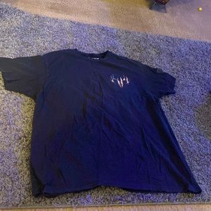 large black, buck wear american t-shirt.